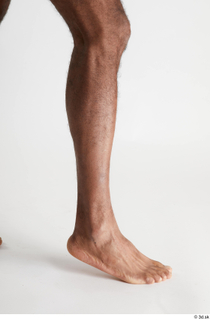 Tiago  1 calf flexing nude side view 0002.jpg